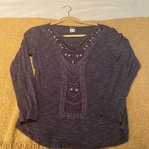 Embellished long sleeve shirt.